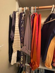 CLOTHING RACK OF WOMENS TOPS, MOSTLY CHICOS SIZE SMALL