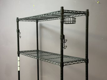 A Black Metal Utility Rack/Shelf