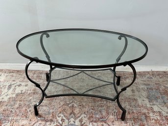 A Pier 1 Metal & Glass Oval Coffee Table