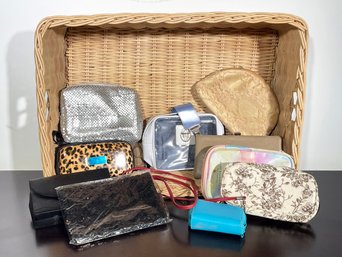 Ladies' Clutches And Makeup Bags In Wicker Basket