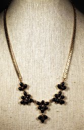 Gold Tone Necklace Having Black White Gemstones Floral Necklace