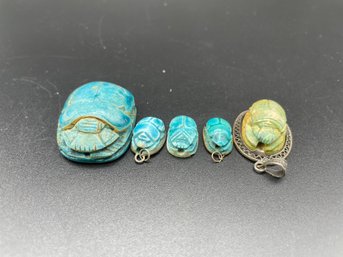 Five Vintage Egyptian  Scarab Pendants/beads . One With Gold Rim.