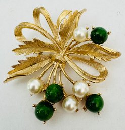 SIGNED SARAH COV GOLD TONE FAUX PEARL ON FAUX JADE BROOCH