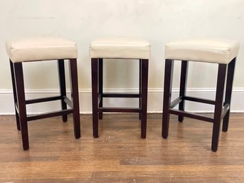 A Trio Of Modern Leather Seated Counter Stools