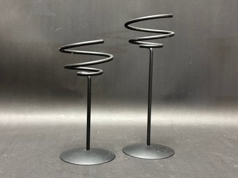 A Pair Of Contemporary Candle Holders With Spiral Tops