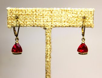 Fine Contemporary Sterling Silver Drop Pierced Earrings Having Red Gemstones