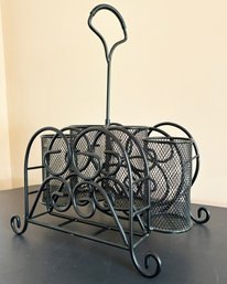 A Wrought Iron Napkin And Condiment Caddy