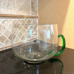 A Large Round Glass Pitcher With Green Handle - A Big Magarita Party In Your Future?