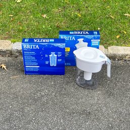 A Pair Of Brita Filters And Pitcher