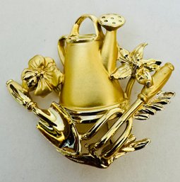 SIGNED AJC GOLD TONE GARDENING TOOLS AND WATERING CAN BROOCH