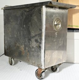 A Commercial Stainless Steel Rolling Tub With Counter Top Lid