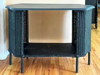 A VINTAGE PAINTED WICKER AND WOOD CONSOLE