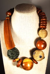 1980s Signed Designer Wood And Leather Beaded Necklace By FABRICE