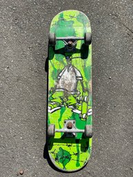 Vintage Skateboard With Cool Lime Green Graphics