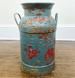 A Vintage Rustic Milk Can