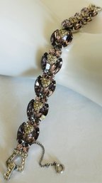 ANOTHER VERY PRETTY AND WELL MADE PURPLE AND WHITE RHINESTONE BRACELET