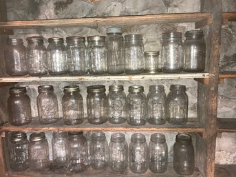 Two Shelves Of Antique Canning Jars