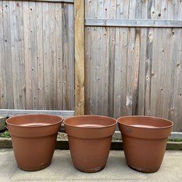 A Trio Of Large Pastic Terra Cotta Planters - 20'