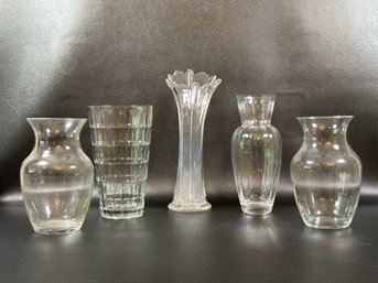 An Assortment Of Vases In Clear Glass