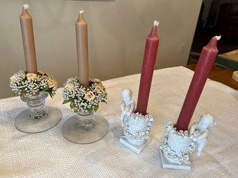 Two Pairs Of Candlesticks With Candles