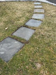 A Group Of 14 Pieces Of Bluestone Path Set In Dirt - Guest House Back