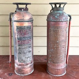 A Pair Of Antique Copper Fire Extinguishers