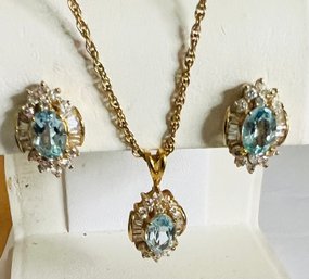 GOLD TONE BLUE TOPAZ AND WHITE STONE NECKLACE AND EARRING SET