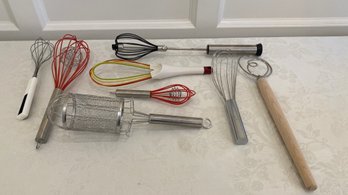 A Group Of Different Whisks