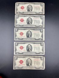 Five 1928 Red Seal 2 Dollar Bills.