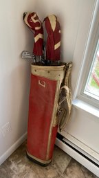 A Vintage Set Of Seven Golf Clubs With Golf Bag By Wilson