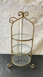 A Vintage Diminutive Wrought Iron Decorative Etagere With Round Glass Shelves