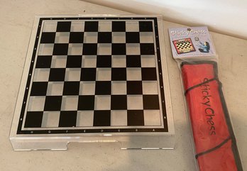 An Acrilyc Chess Board & Sticky Travel Chess Game