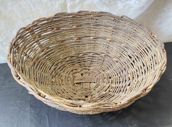 An Antique Woven Centerpiece Basket