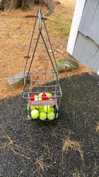 A Gamma Tennis Ball Hopper With Used Tennis Ball