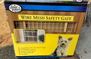 A Used Wire Mesh Safety Pet Gate