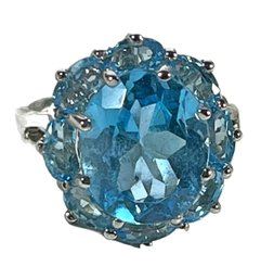 Sterling Silver Blue Topaz Cocktail Ring Surrounded By Blue Topaz Stones