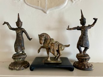 Three  Oriental Metal Statues.