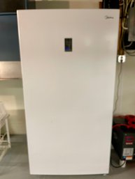 Upright Midea Freezer.