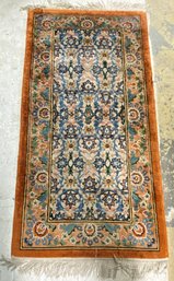 A Rust, Teal, Brown & Cream Small Area Rug  With Fringe 25'w X 48'l
