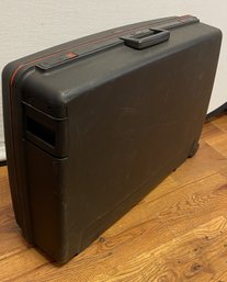 A Vintage Delsey Hard Shell Luggage On Wheels