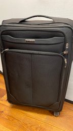 A Samsonite Softside Carry-On Spinner - Luggage