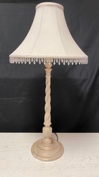 A Twist Candlestick Lamp With Beaded Fabric Shade