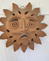 A Decorative Terracotta Sun