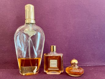 Three Vintage Perfume Bottles.