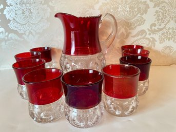 Vintage Ruby Glass Thumbnail Pitcher And 9 Glasses.