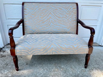 Contemporary Settee With Tiger Like Fabric Upholstery .