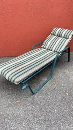 An Aluminum Sling Outdoor Chaise Lounge Chair With Cushion
