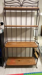 A Vintage Metal Bakers Rack With 4 Wood Shelves