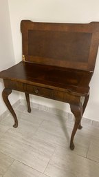 An Antique Wood Game Table With Single Drawer