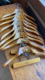 A Group Of Nine Solid Wood Hangers By Globus Germany And Setweel USA